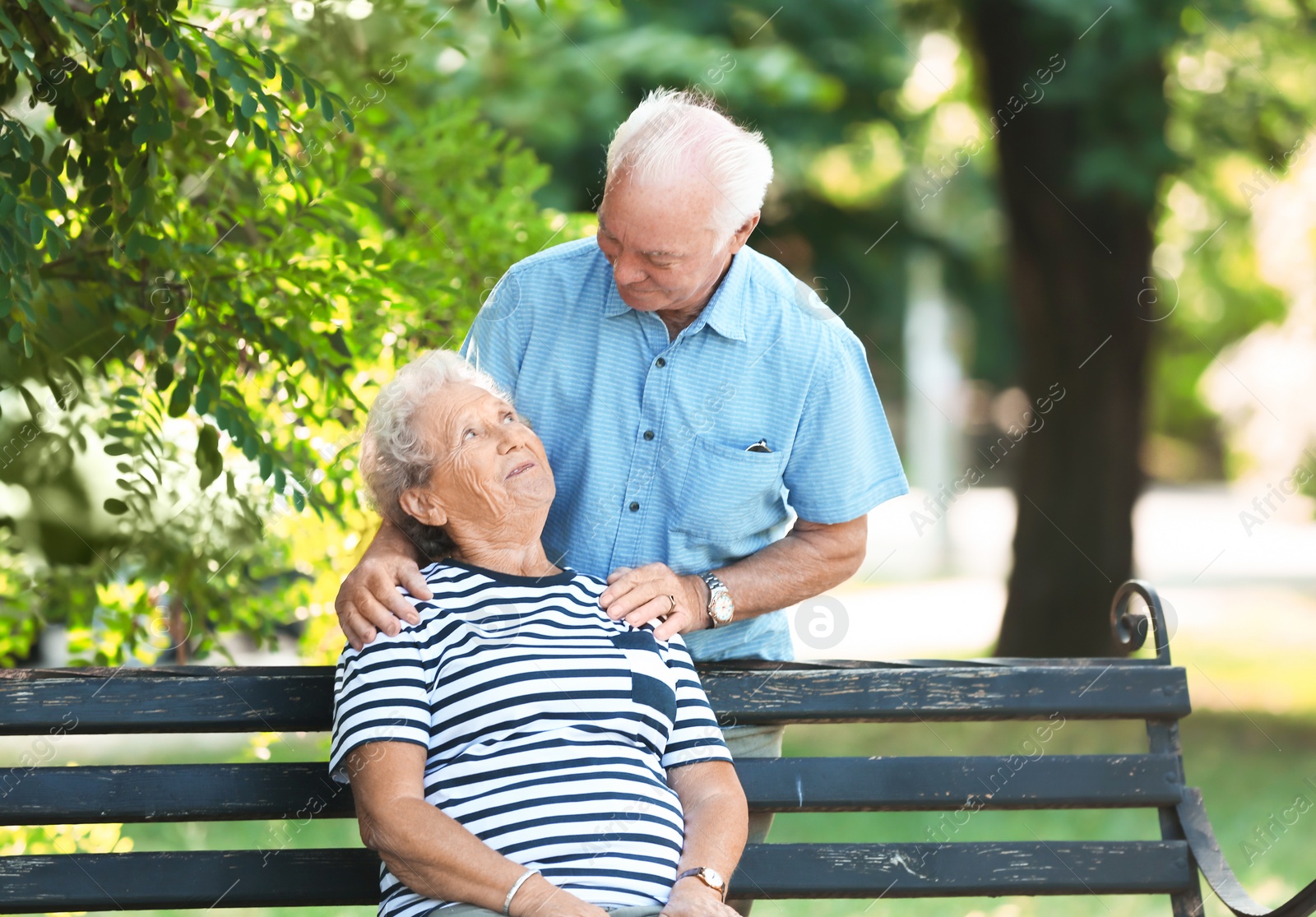 Photo of Elderly couple spending time together in park