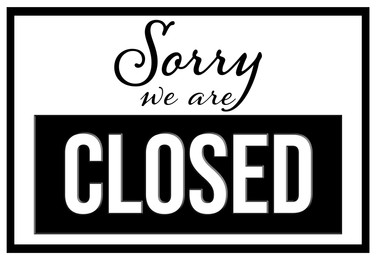 Image of Sorry we are closed sign. Text on white background