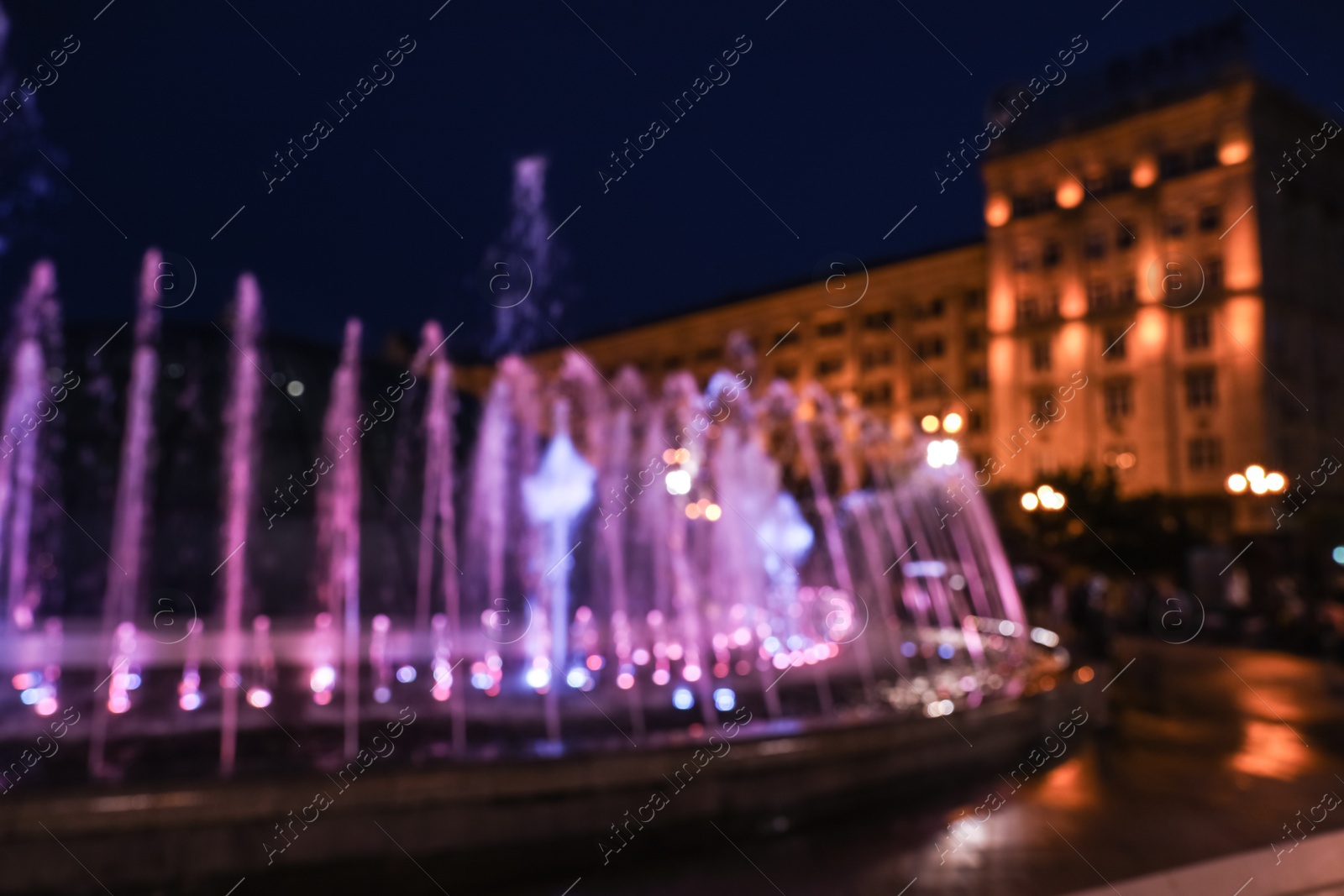 Photo of Blurred view of beautiful city at night. Bokeh effect