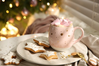 Photo of Composition with cup of hot drink on windowsill