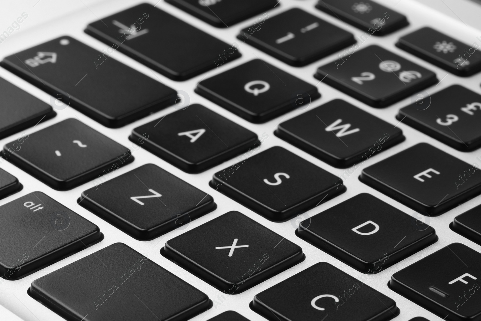 Photo of Closeup view of buttons on modern computer keyboard