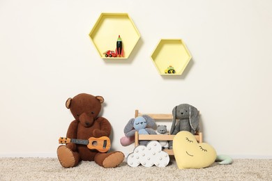 Soft toys and shelfs in beautiful children's room