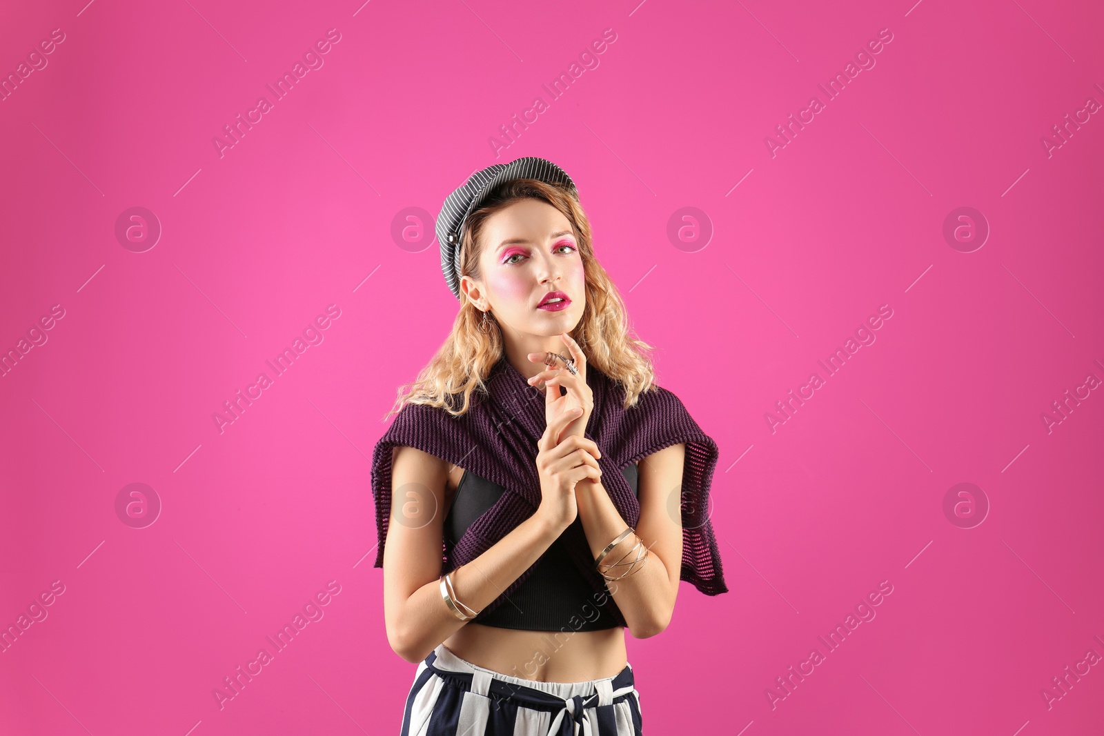 Photo of Beautiful young woman posing on color background. Summer fashion