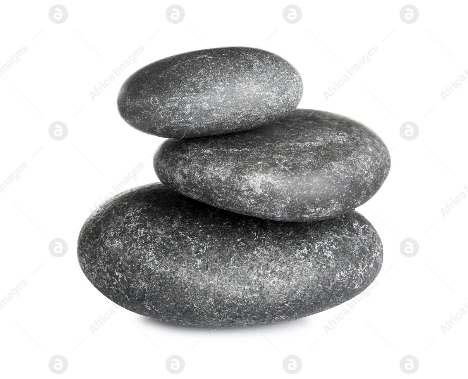 Photo of Stack of zen spa stones on white background