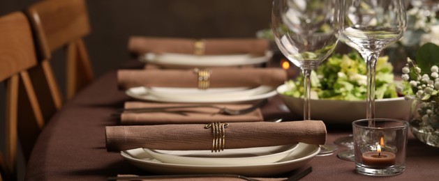 Stylish elegant table setting for festive dinner in restaurant. Banner design