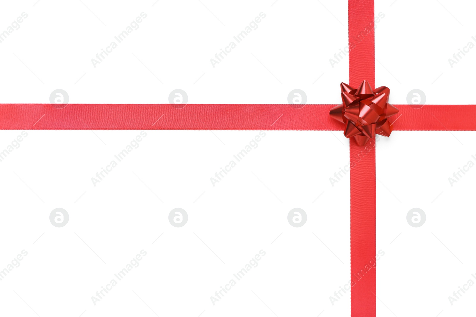 Photo of Red ribbons with bow on white background, top view