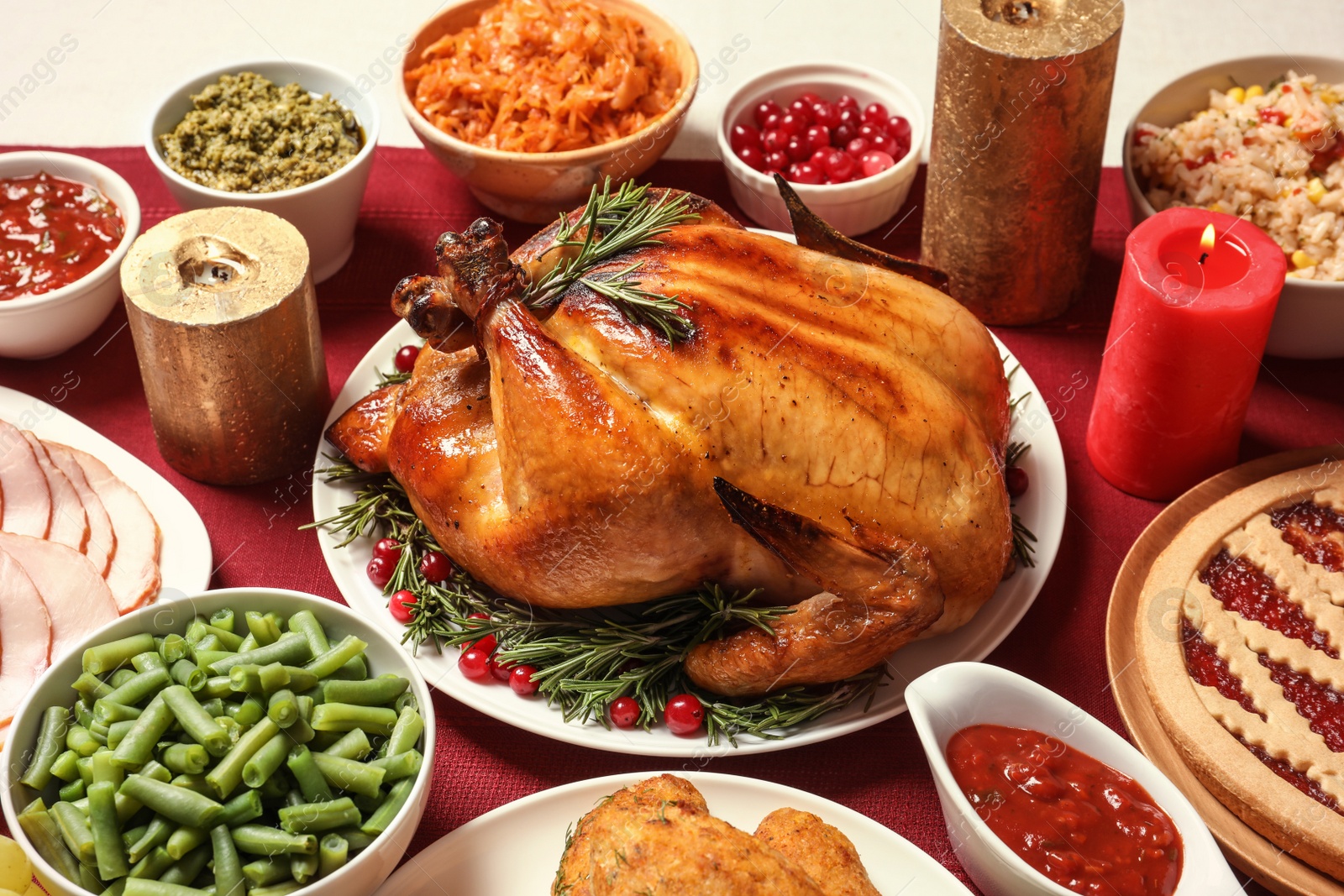 Photo of Traditional festive dinner with delicious roasted turkey served on table