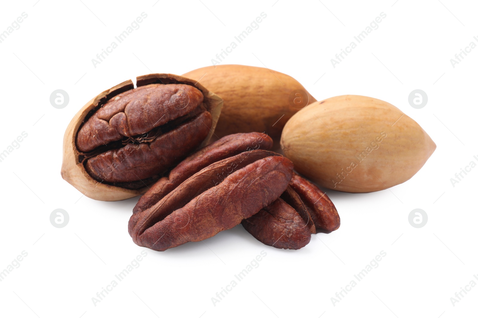 Photo of Many tasty pecan nuts isolated on white