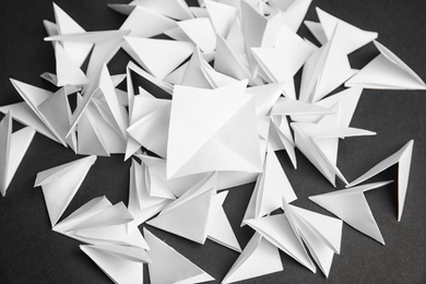 Photo of Pile of paper pieces for lottery on dark background