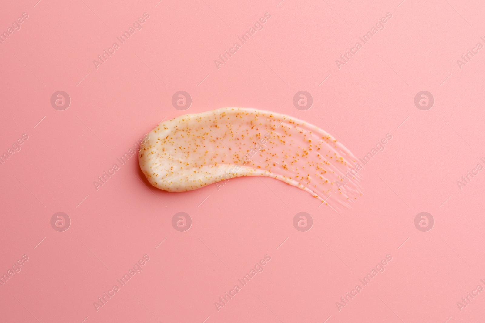 Photo of Sample of scrub on pink background, top view