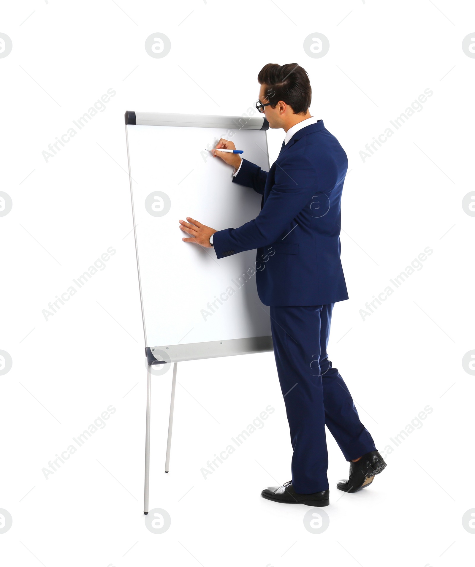 Photo of Professional business trainer near flip chart on white background