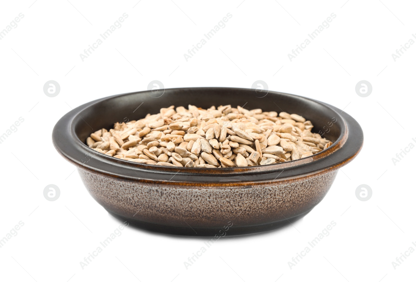 Photo of Peeled sunflower seeds in bowl isolated on white