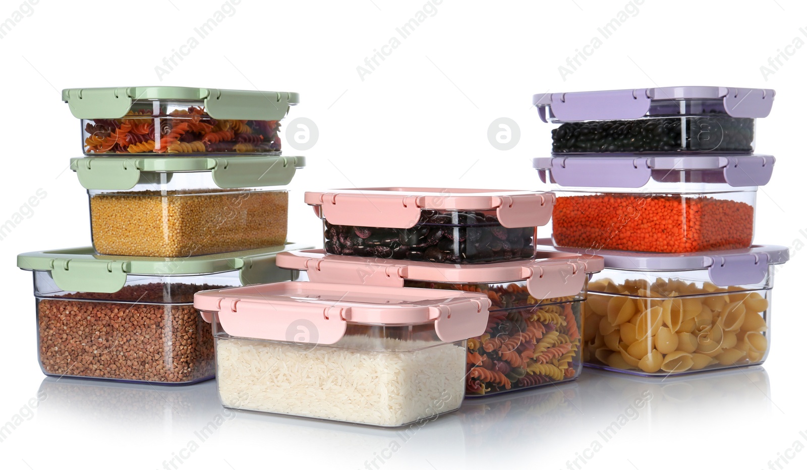 Photo of Boxes with uncooked products on white background