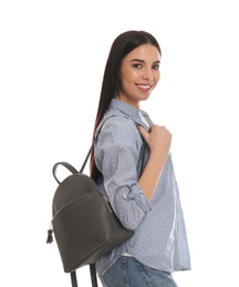 Young woman with stylish backpack on white background