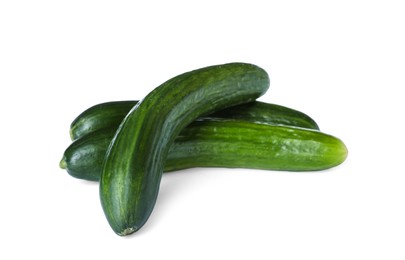 Photo of Whole fresh green cucumbers isolated on white