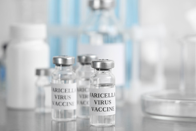 Photo of Chickenpox vaccine on table in laboratory. Varicella virus prevention
