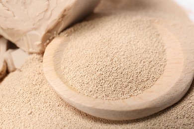 Active dry granulated yeast as background, closeup view