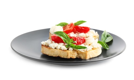 Photo of Tasty fresh tomato bruschettas on white background