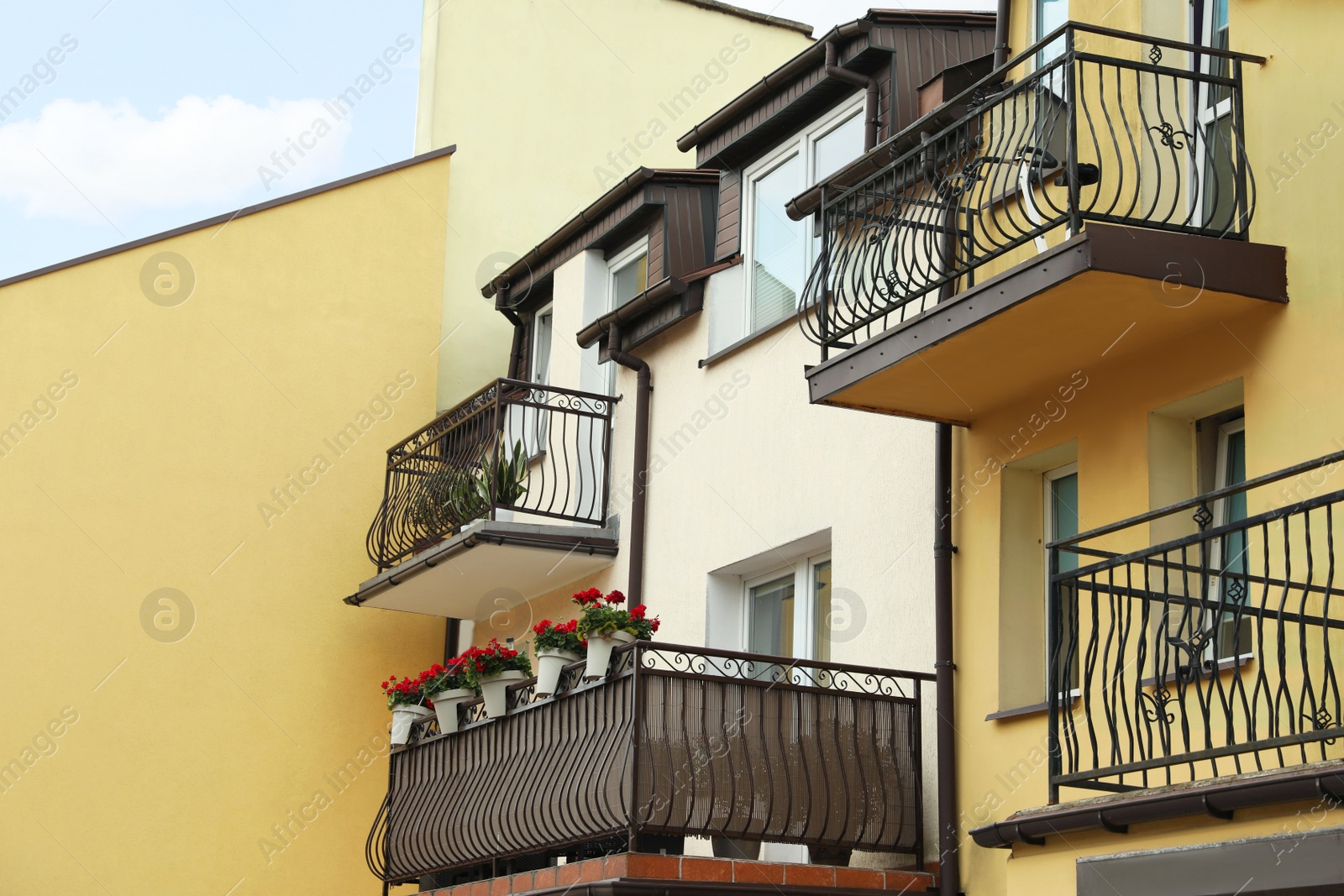 Photo of Beautiful view of building with stylish balconies