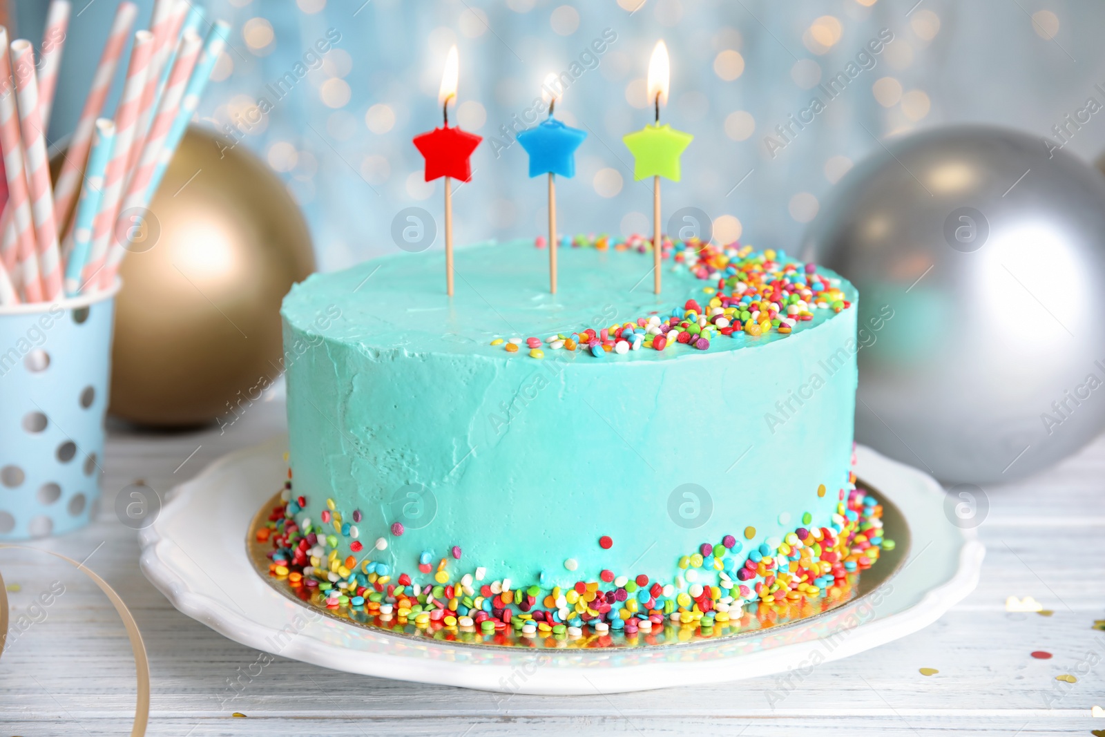 Photo of Fresh delicious birthday cake with candles on wooden table