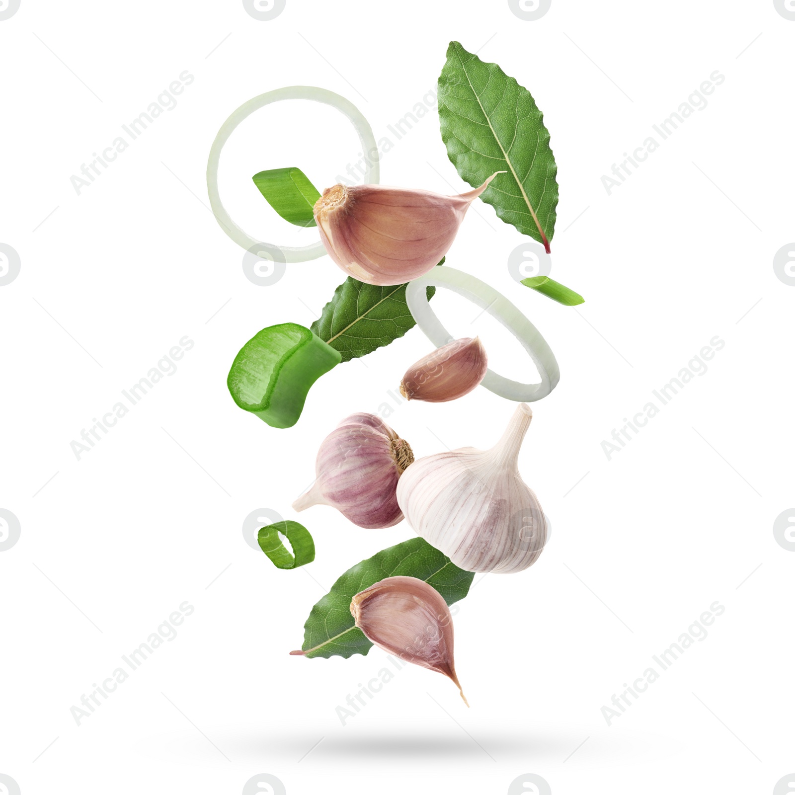 Image of Different aromatic spices falling on white background