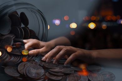 Image of Double exposure of woman with laptop and US coins, closeup. Financial value