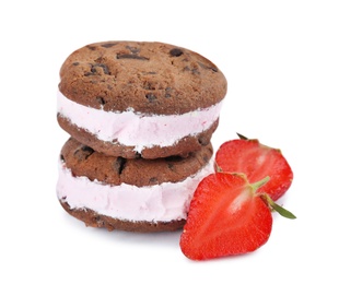 Photo of Sweet delicious ice cream cookie sandwiches and strawberry on white background