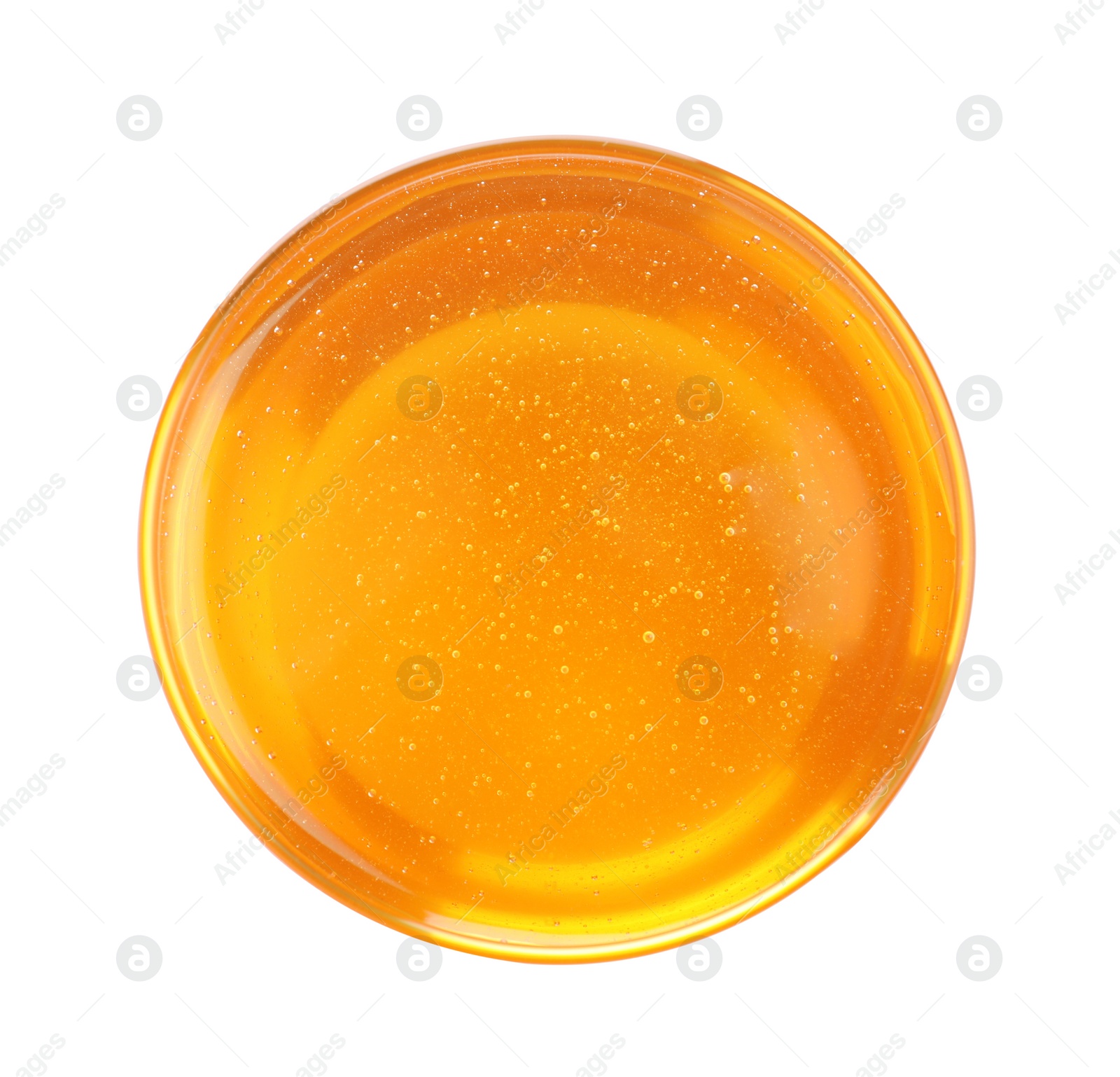 Photo of Bowl of organic honey isolated on white, top view
