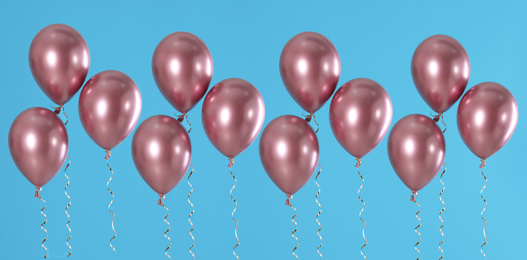 Image of Set of color balloons on blue background