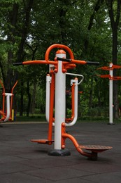 Photo of Empty outdoor gym with twister and surfer