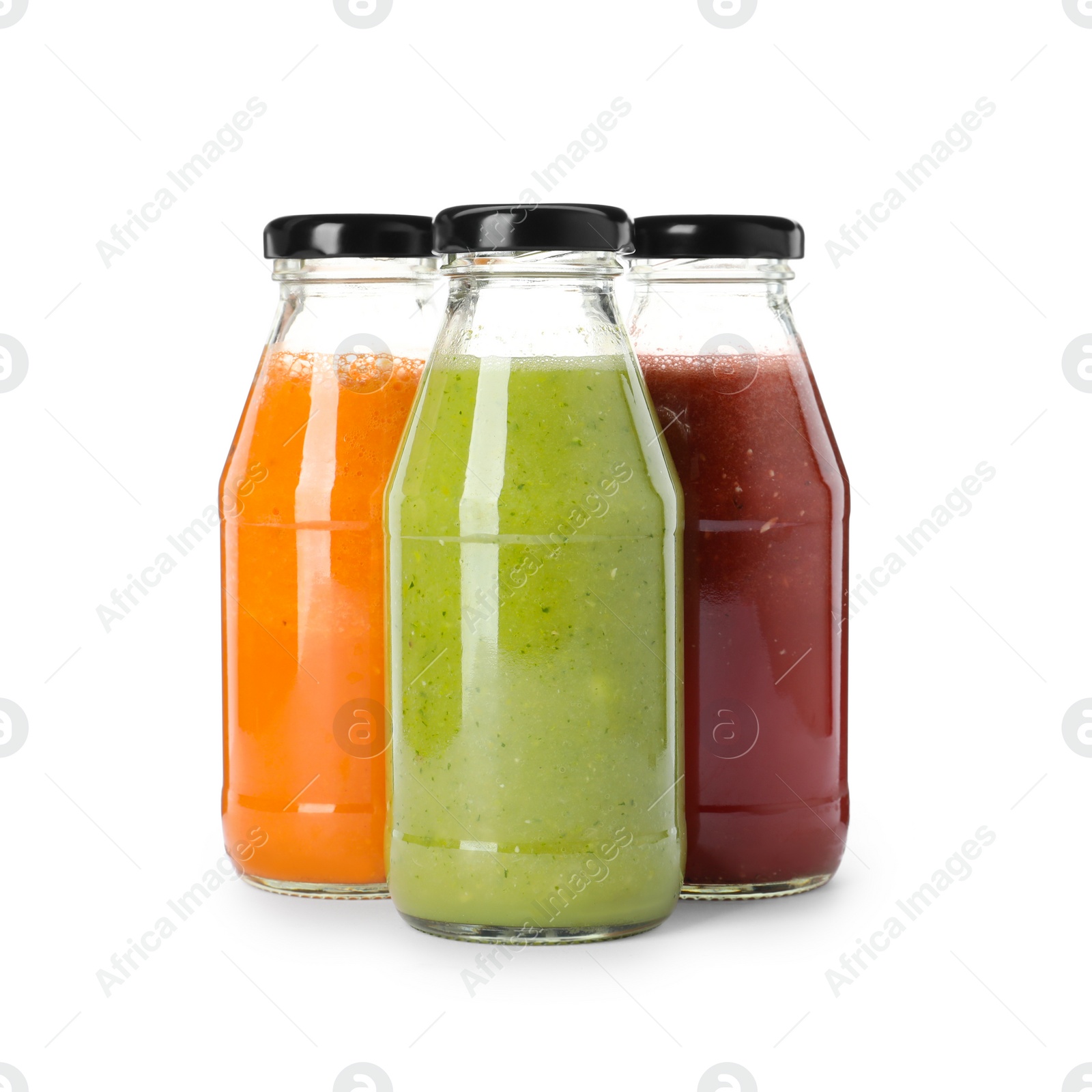 Photo of Bottles of fresh juices on white background