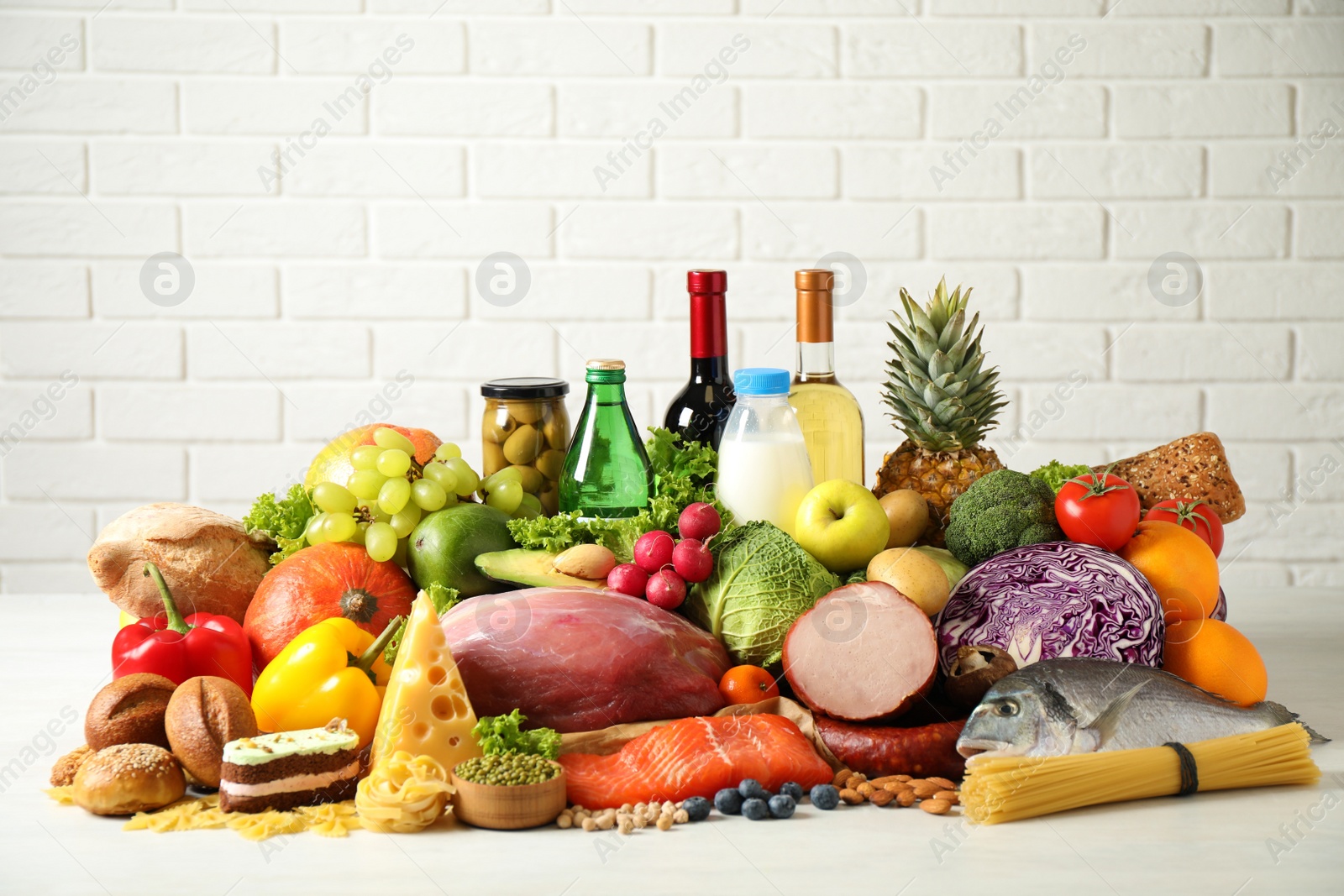 Photo of Different products on white table. Healthy food and balanced diet