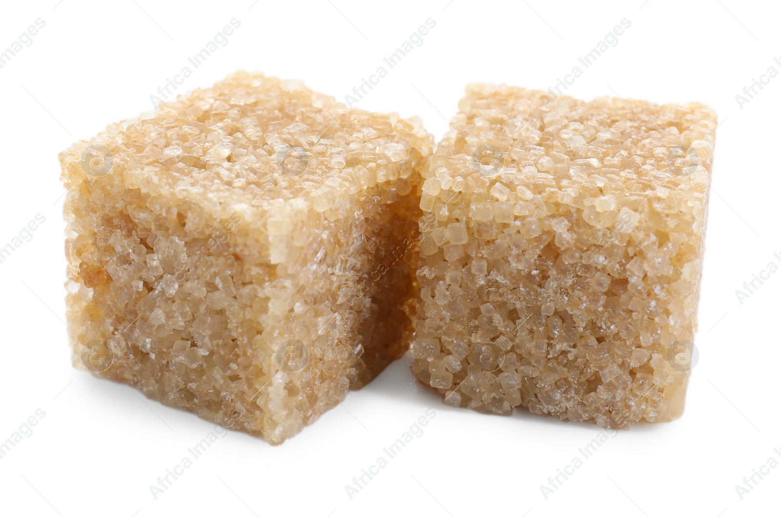 Photo of Two brown sugar cubes isolated on white