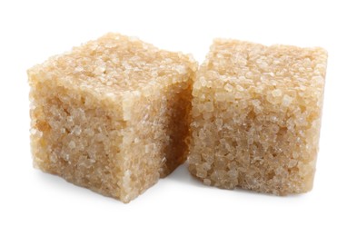 Photo of Two brown sugar cubes isolated on white