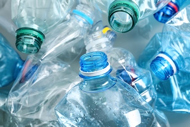 Photo of Many plastic bottles as background, closeup. Recycle concept