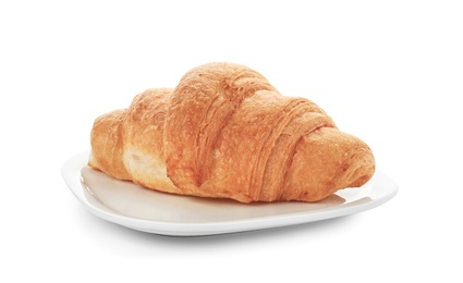 Photo of Plate with tasty croissant on white background
