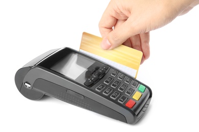 Woman using modern payment terminal on white background, closeup