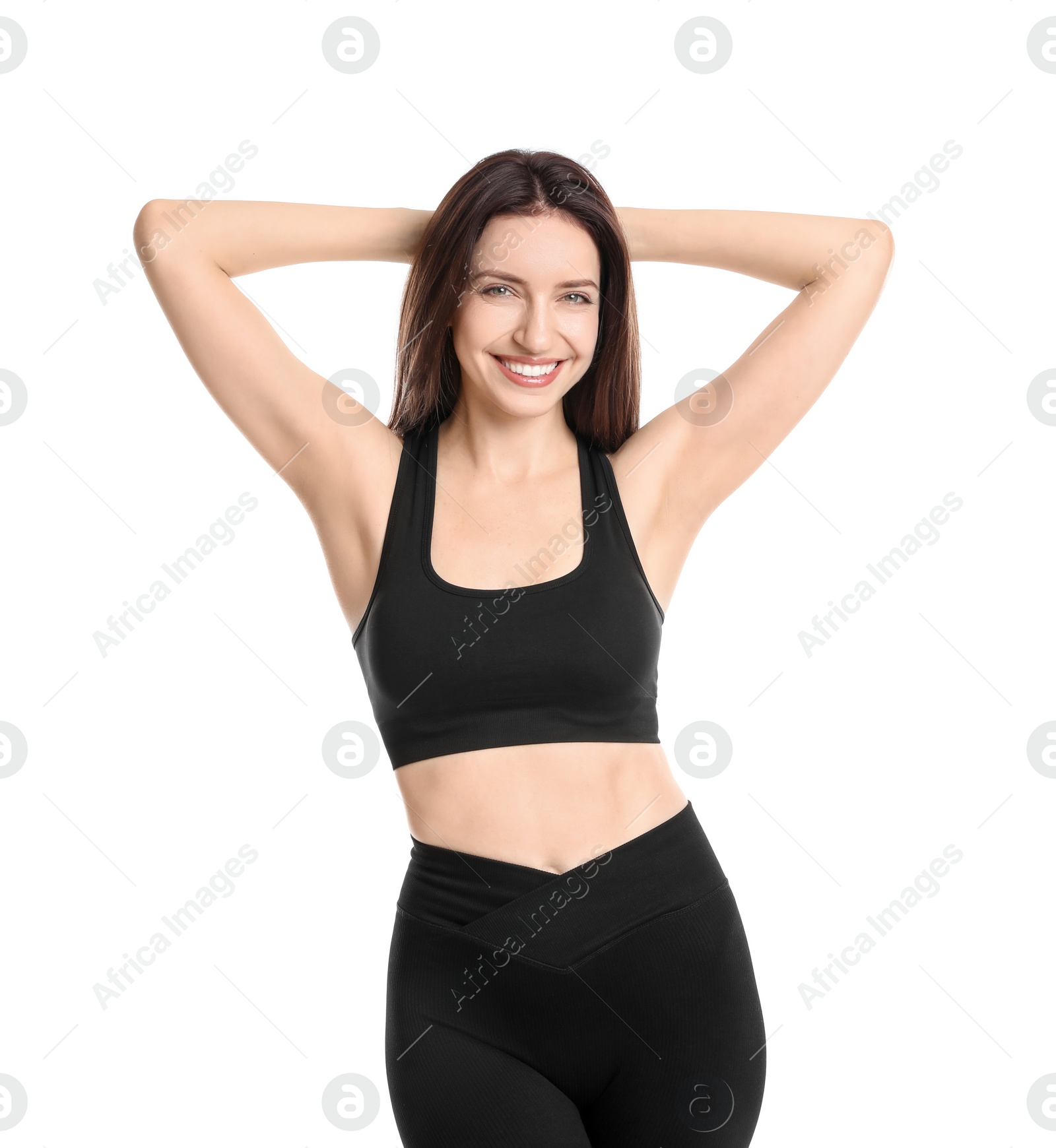 Photo of Happy young woman with slim body posing on white background