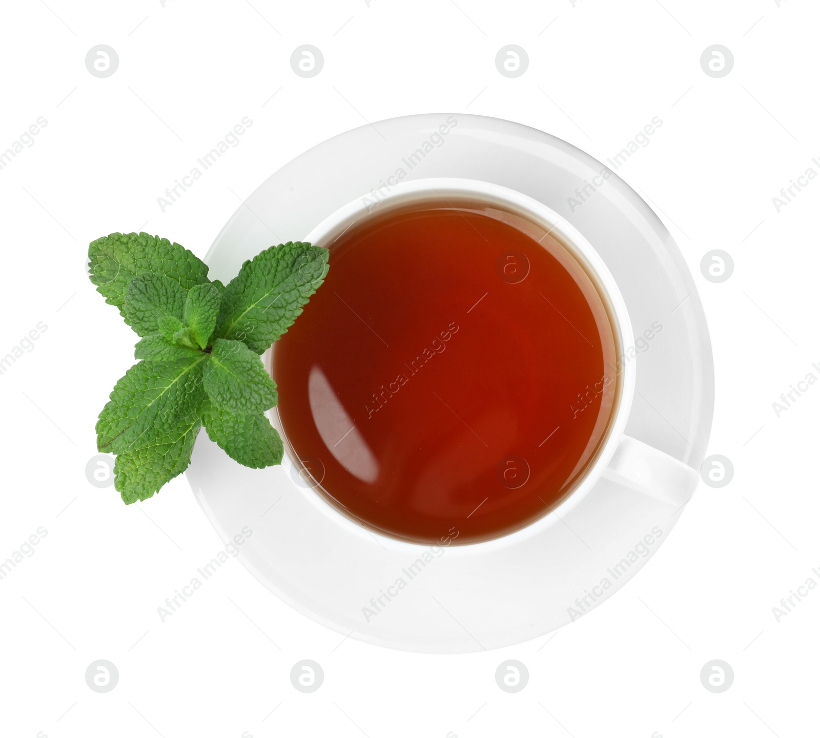 Photo of Cup of aromatic black tea with fresh mint on white background, top view