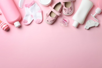 Photo of Flat lay composition with baby accessories on color background. Space for text