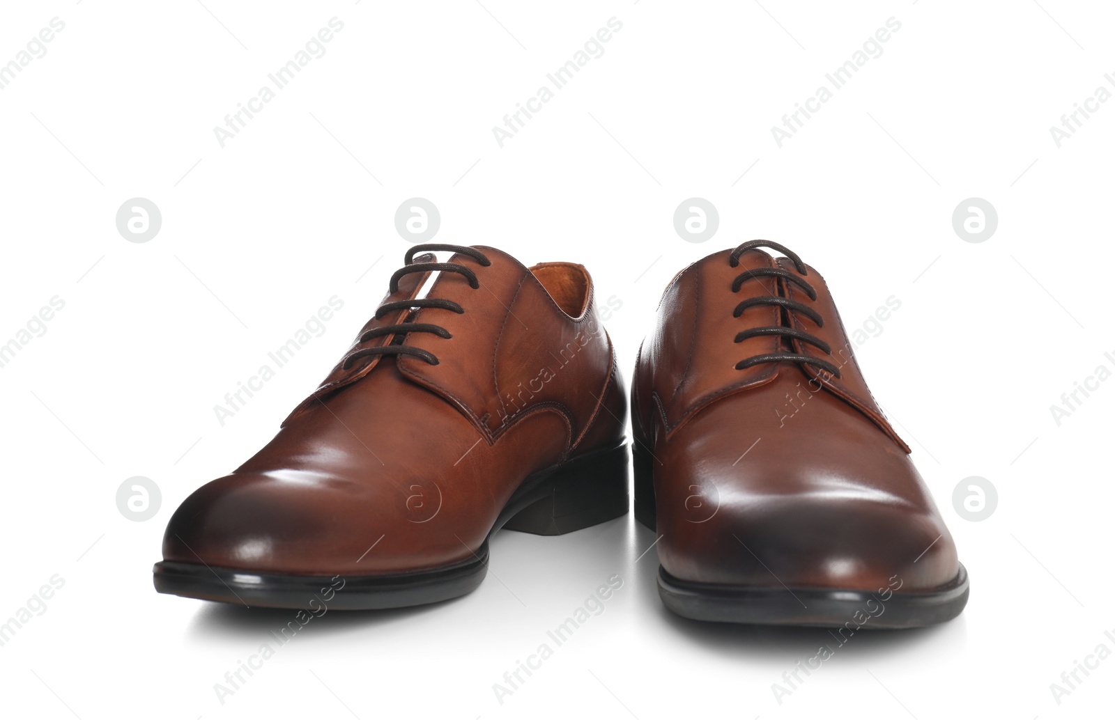 Photo of Classic wedding shoes for groom on white background