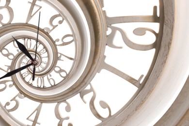 Image of Infinity and other time related concepts. White clock face twisted in spiral, fractal pattern