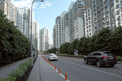 Photo of KYIV, UKRAINE - MAY 21, 2019: Beautiful view of modern housing estate in Pecherskyi district on sunny day