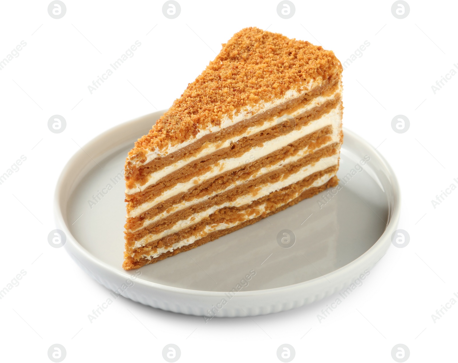 Photo of Slice of delicious honey cake isolated on white