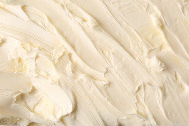 Photo of Texture of tasty homemade butter as background, top view