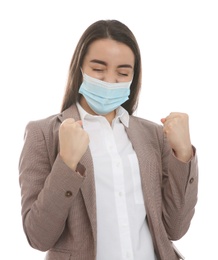 Photo of Emotional businesswoman with protective mask on white background. Strong immunity concept