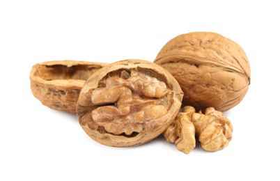 Fresh ripe tasty walnuts on white background