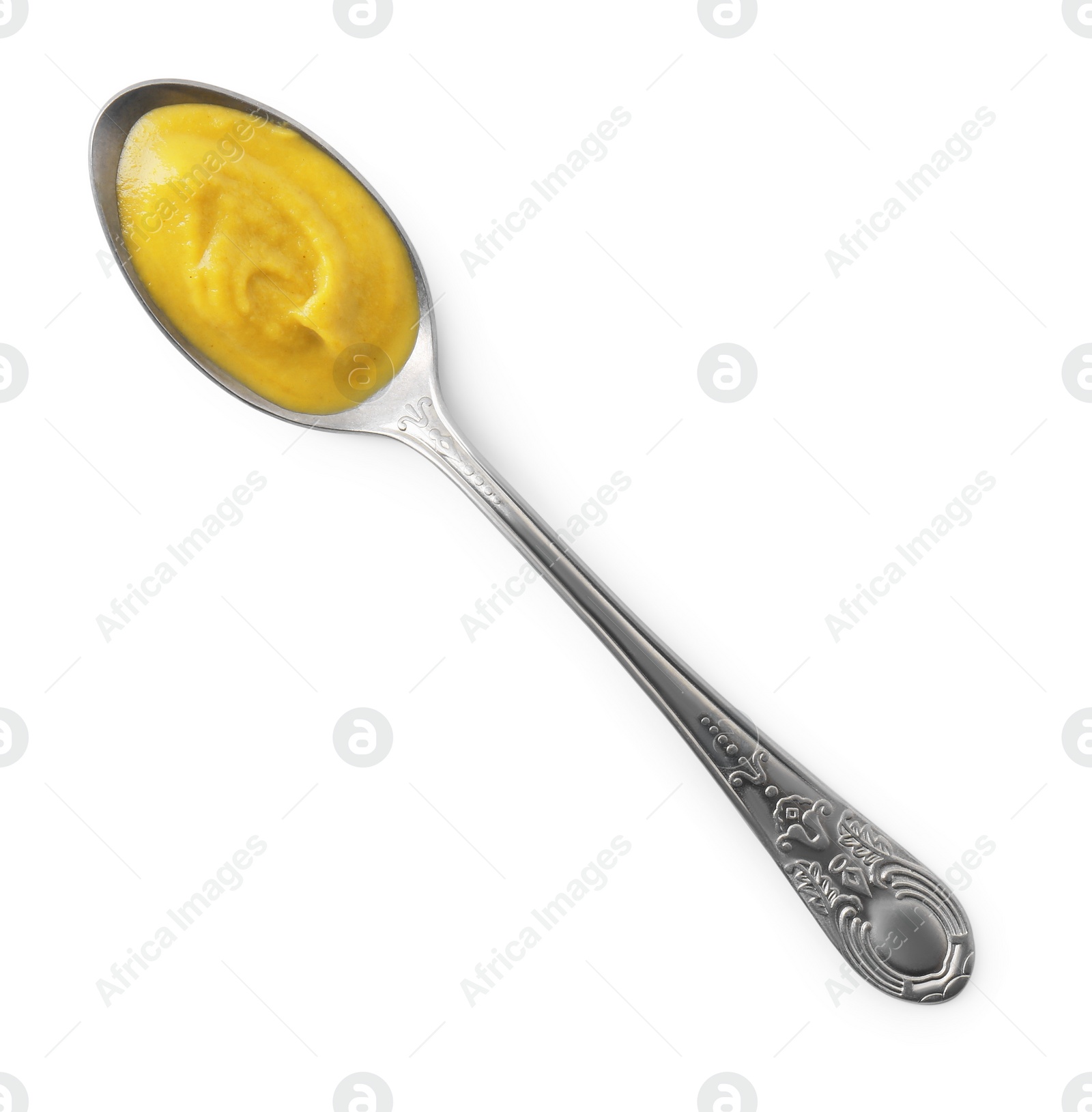 Photo of Fresh tasty mustard sauce in spoon isolated on white, top view