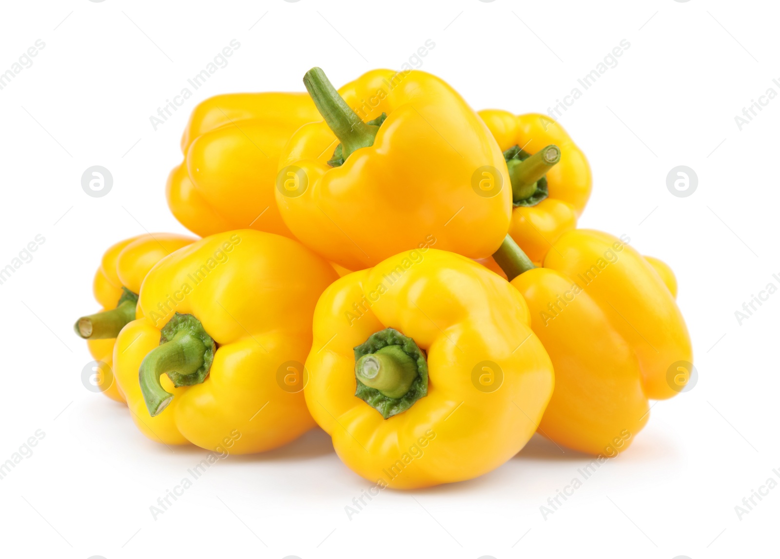 Photo of Ripe yellow bell peppers isolated on white