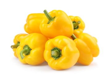 Photo of Ripe yellow bell peppers isolated on white